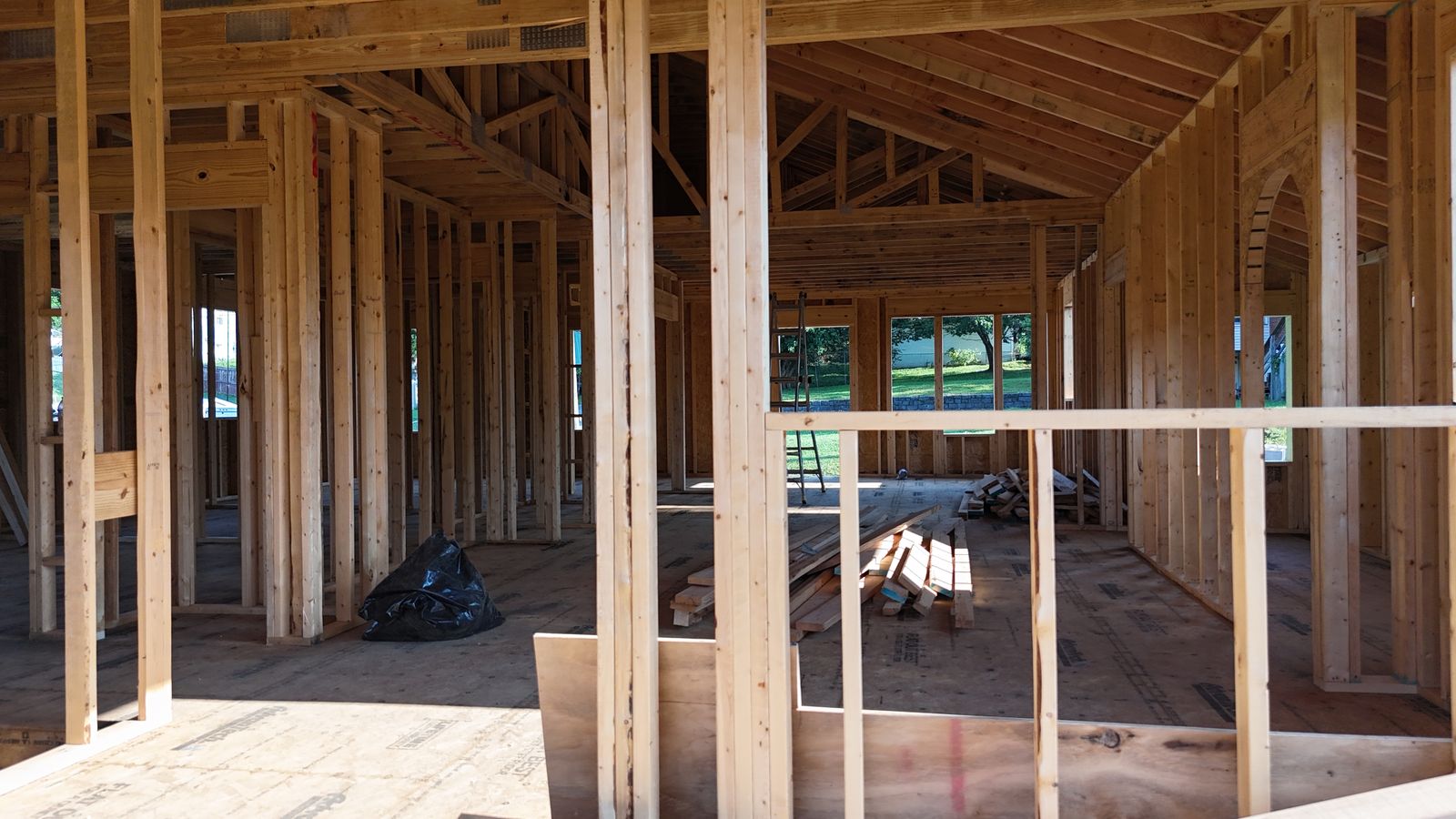 Interior wood framing, studs and rafters.