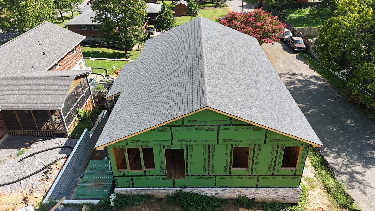 Aerial of a ZIP-sheathed house with architectural shingles.