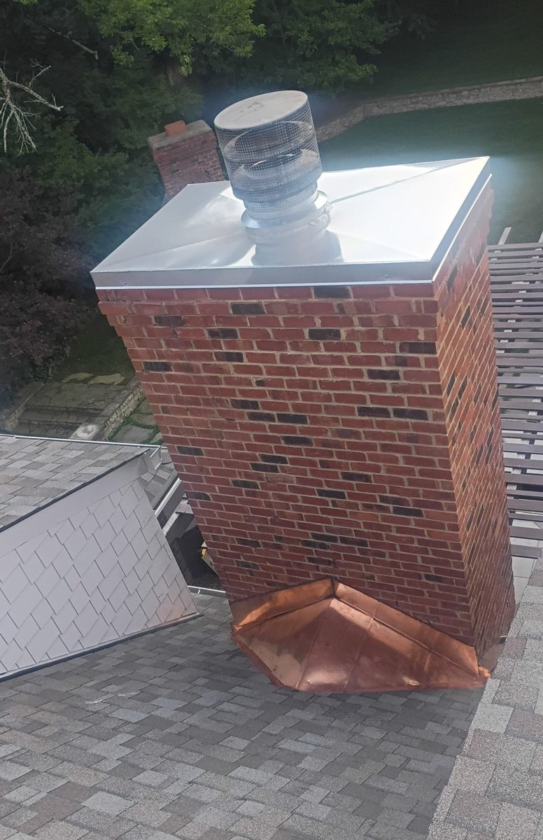 Copper chimney cap and flashing on a brick chimney, private residence, Middle Tennessee