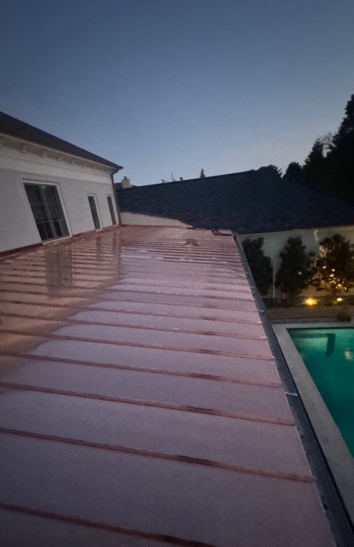 Copper standing seam roof over a pool terrace, private residence, Middle Tennessee